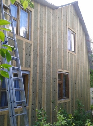 Утепление стен деревянного дома и облицовка сайдингом